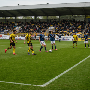 Zwei Mannschaften bei einem Fussballspiel.